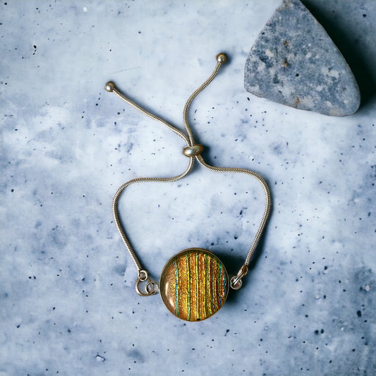 Adjustable Bracelet with Dazzling Striped Dichroic Glass Pendant, orange, gold, yellow, green, handmade